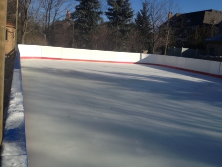 Portable ice rink with piping and headers
