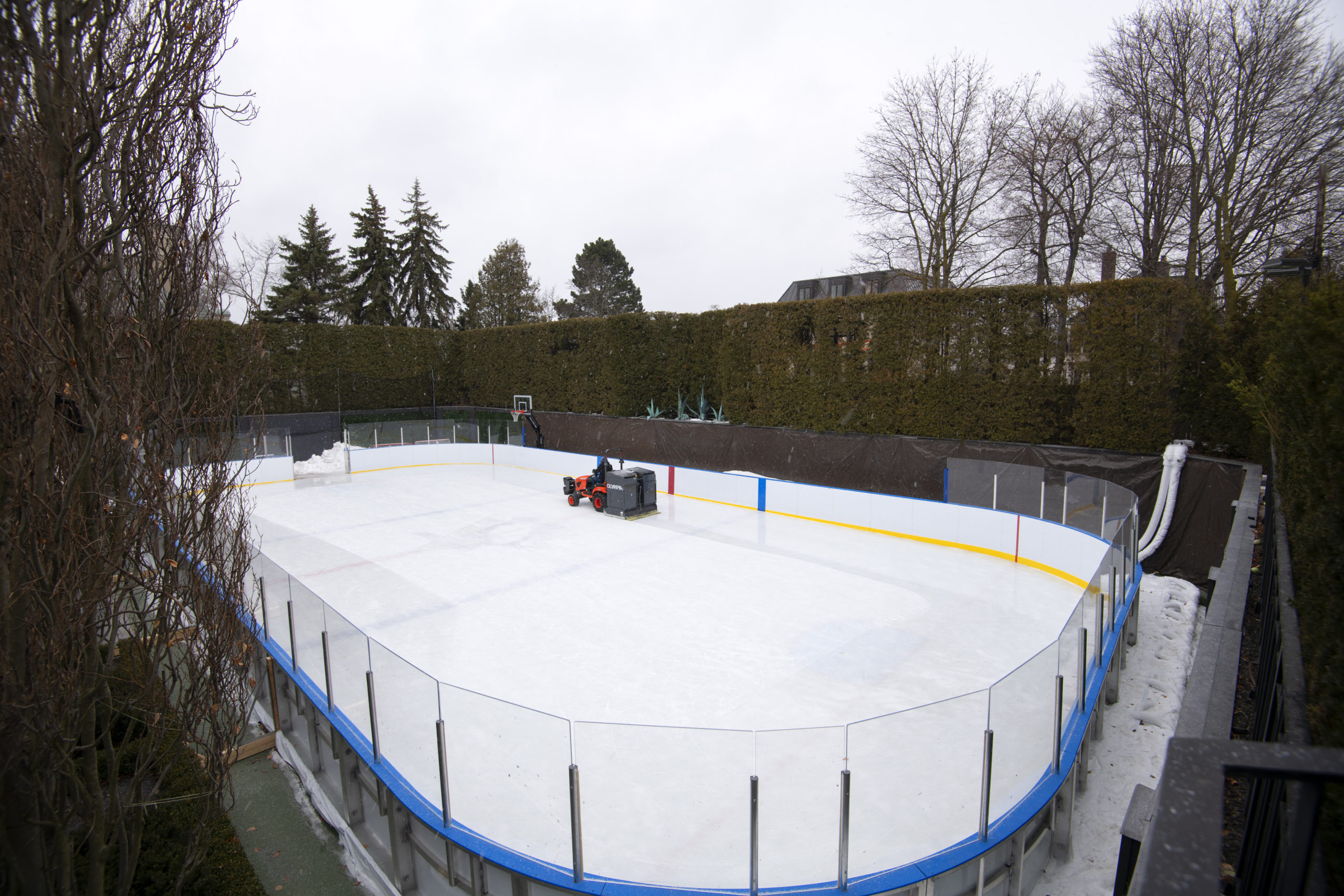 Portable refrigerated rink on a tennis court