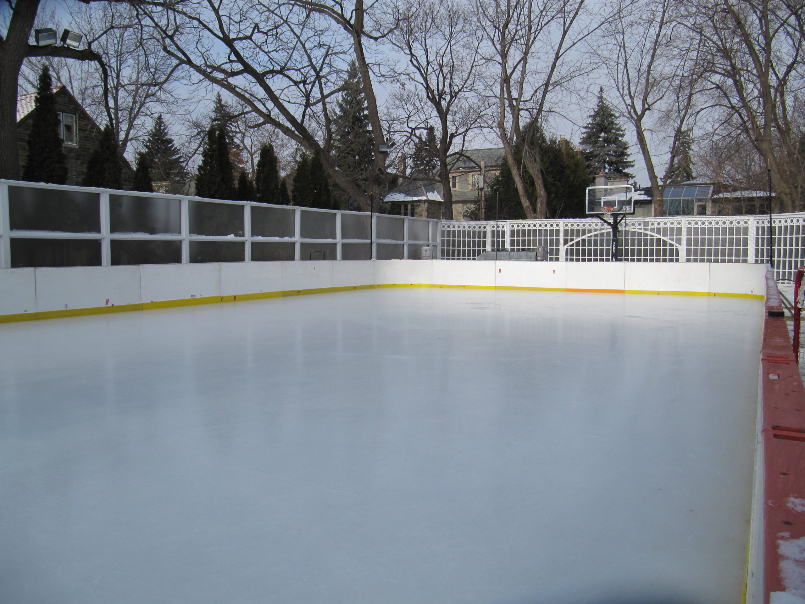 Portable refrigerated rink on a basketball court