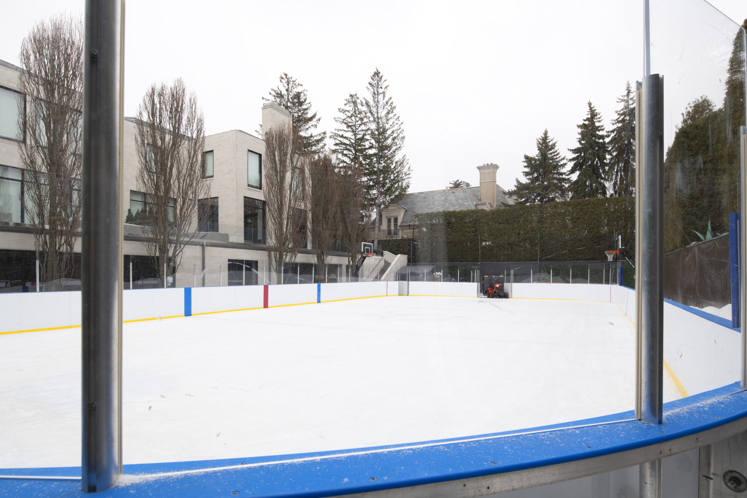 Portable refrigerated rink on a tennis court